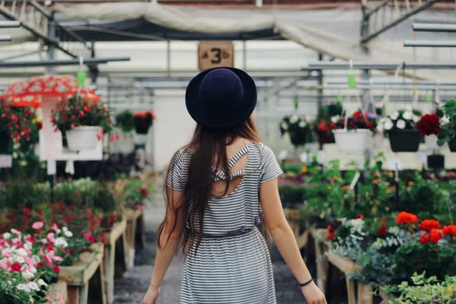 woman practicing mindulfulness and gardening