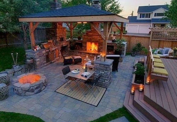 backyard landscaping with outdoor kitchen